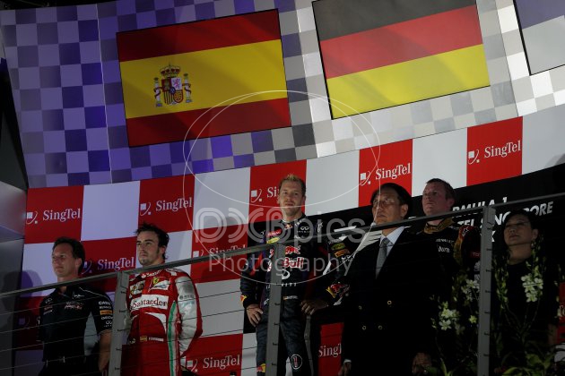 1st Sebastian Vettel (GER), Red Bull Racing, 2nd Fernando Alonso (ESP),Scuderia Ferrari, 3rd Kimi Raikkonen (FIN), Lotus F1 Team