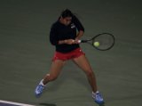 M Bartoli (FRA) return a serve to P Shuai (CHN) during Dubai Duty Free Tennis Championship 2012 (dxbpics/ Paul Jordaan)